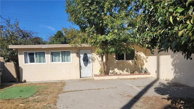 view of front of home featuring a patio