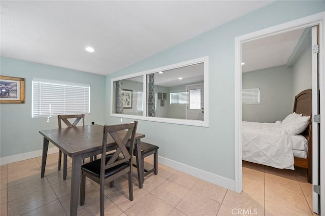 dining space with light tile patterned floors