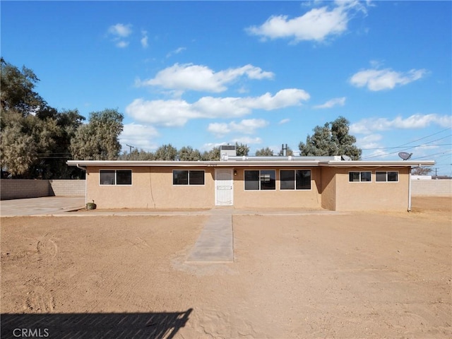 view of front of home featuring a patio