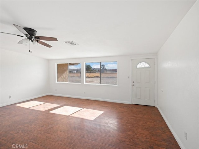 foyer featuring wood-type flooring and ceiling fan