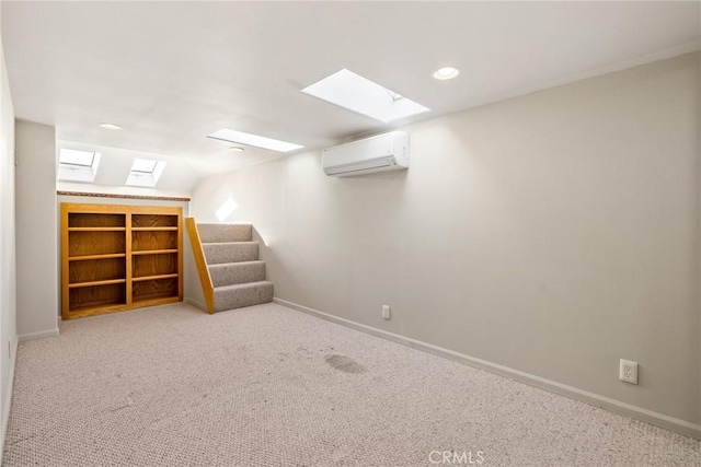 basement featuring light carpet and a wall unit AC