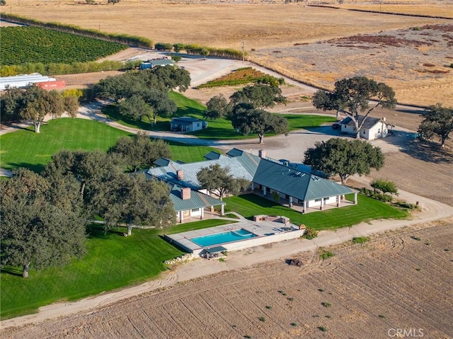 birds eye view of property featuring a rural view