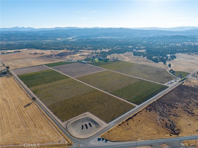 bird's eye view with a mountain view and a rural view