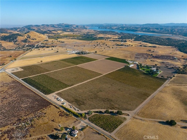 birds eye view of property with a rural view