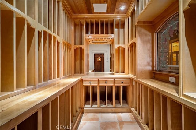 wine room featuring wooden ceiling