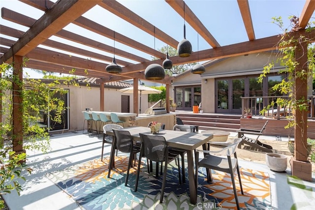 view of patio with french doors, a pergola, and an outdoor bar