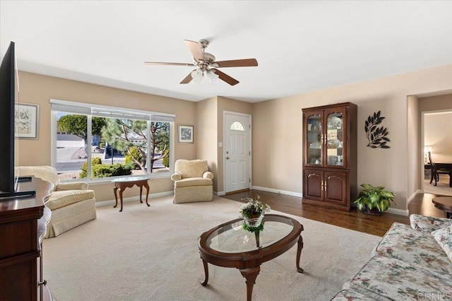 living room with ceiling fan