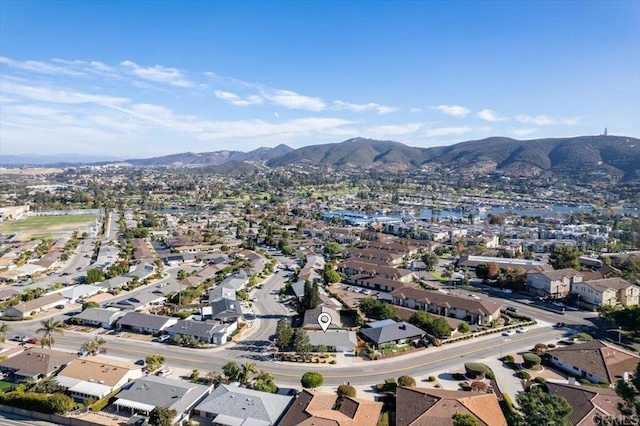 birds eye view of property with a mountain view