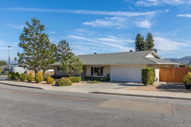 single story home featuring a garage