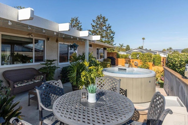 view of patio featuring a hot tub