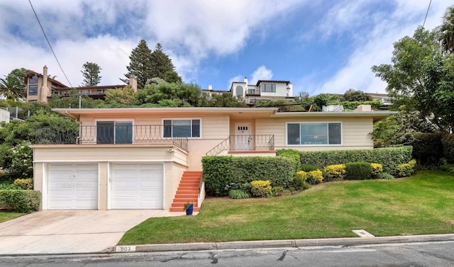 front facade with a front lawn and a garage