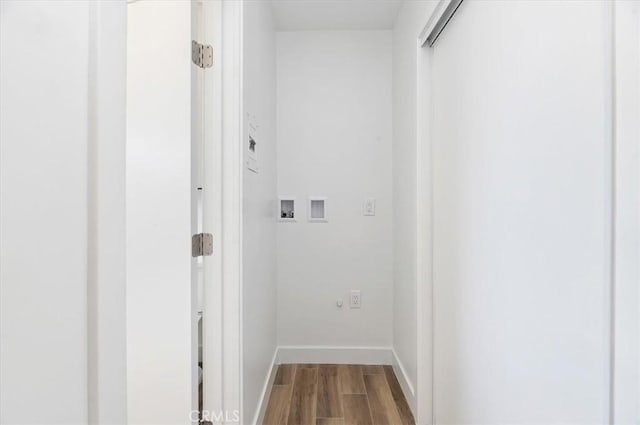 hallway with wood-type flooring