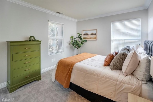 carpeted bedroom with crown molding