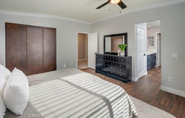 bedroom with ceiling fan, dark hardwood / wood-style flooring, ornamental molding, and a closet