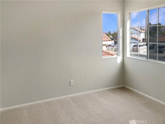 empty room with carpet floors