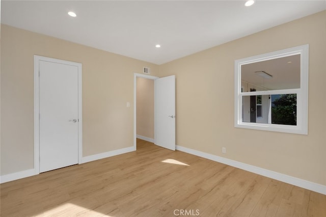 unfurnished bedroom featuring light hardwood / wood-style floors