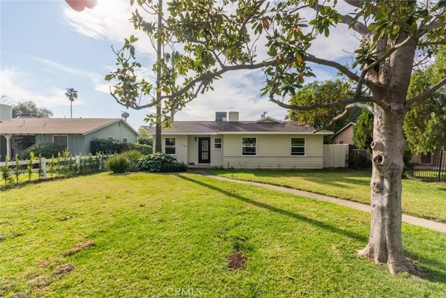 view of front of home with a front lawn