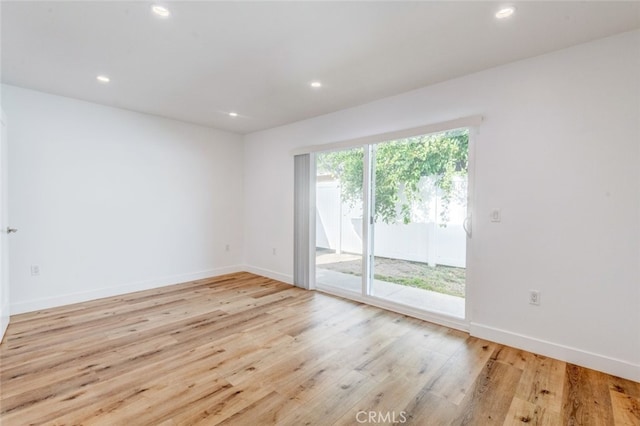 empty room with light wood-type flooring