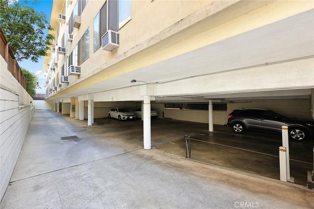 garage with an AC wall unit