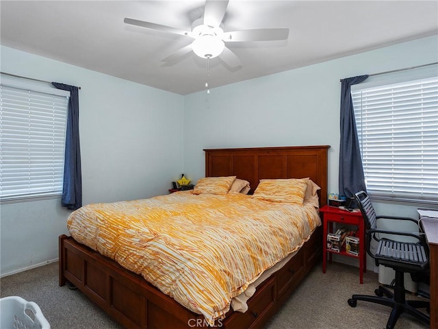 bedroom with light colored carpet and ceiling fan