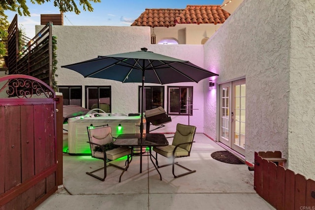 patio terrace at dusk with french doors