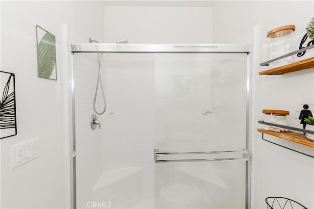 full bath featuring a stall shower