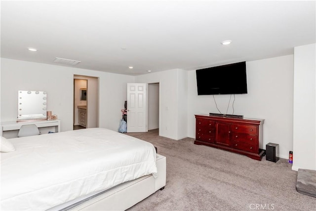 bedroom featuring recessed lighting and carpet