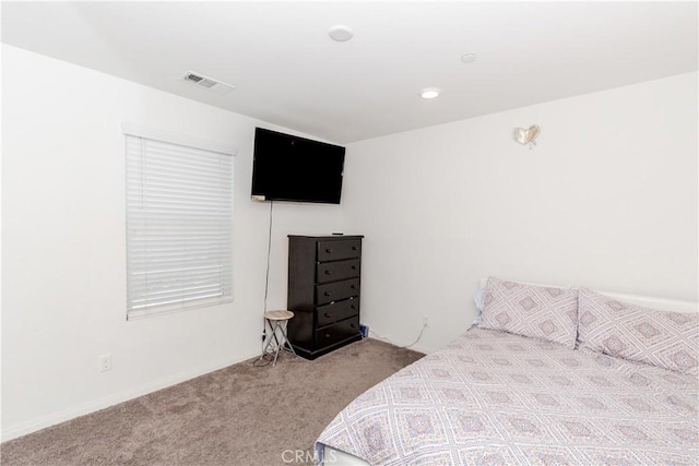 bedroom with carpet and visible vents