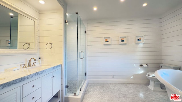 bathroom with vanity, plus walk in shower, and wood walls