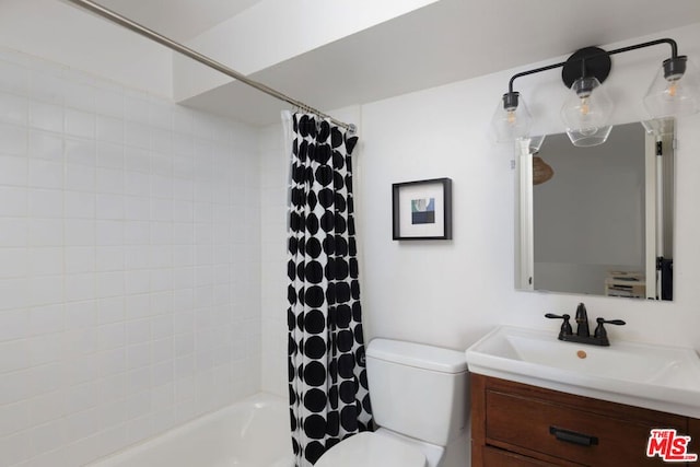 full bathroom featuring vanity, shower / bath combination with curtain, and toilet