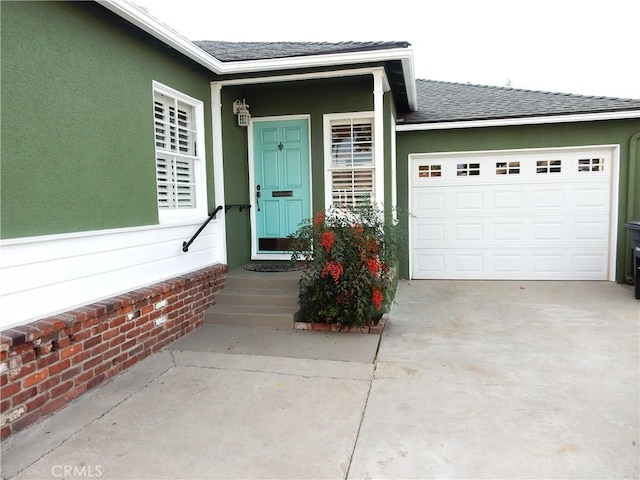 property entrance with a garage