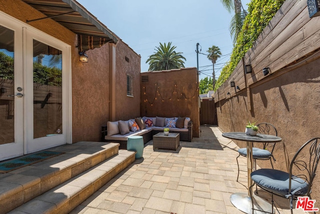 view of patio / terrace with french doors and an outdoor hangout area