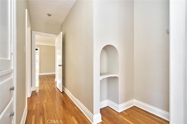 hall with light wood-type flooring