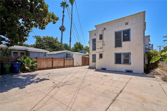 rear view of house with a patio