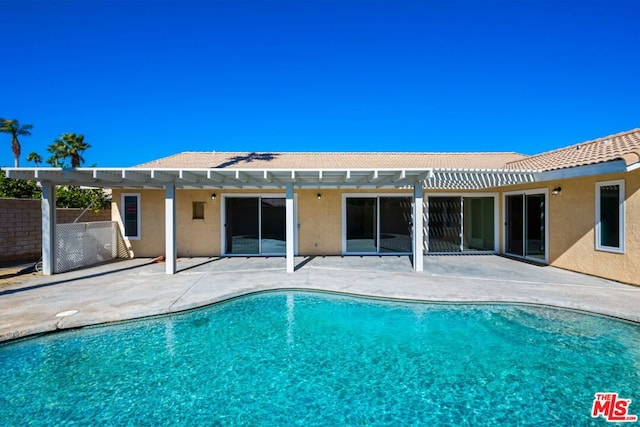 view of pool featuring a patio area and a pergola