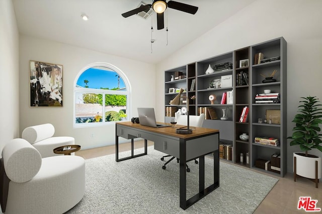 office with ceiling fan and lofted ceiling