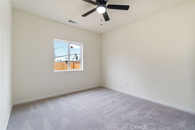 unfurnished room featuring carpet floors and ceiling fan