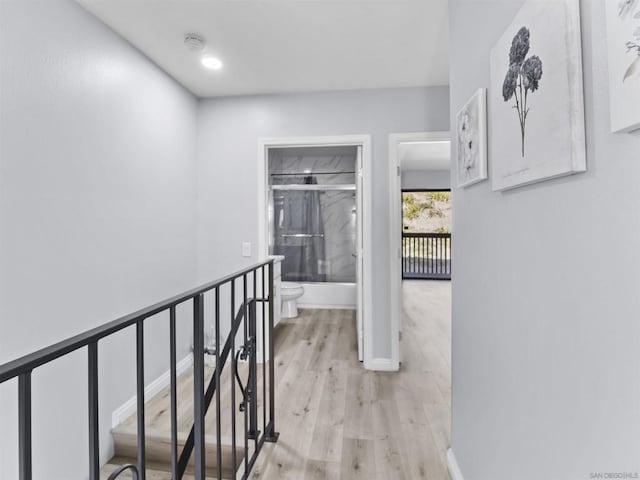 corridor featuring light hardwood / wood-style flooring