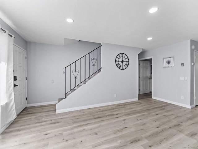 foyer with light hardwood / wood-style flooring