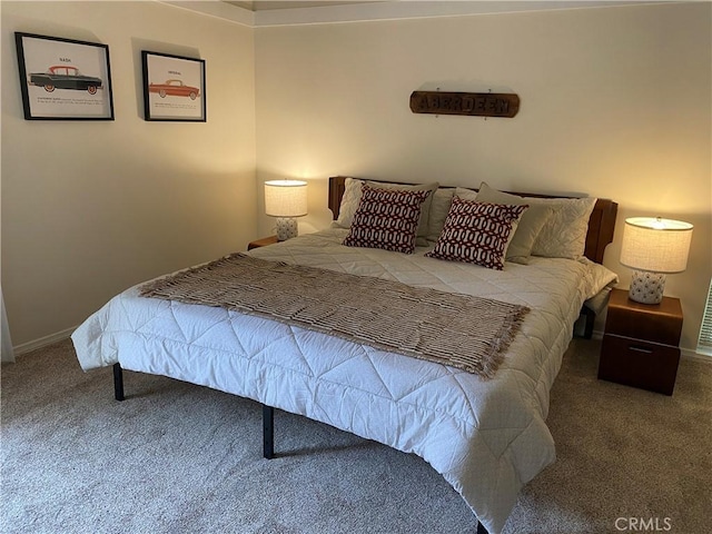 bedroom featuring carpet flooring