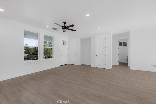 interior space featuring ceiling fan and light hardwood / wood-style flooring