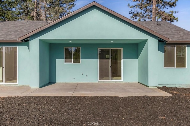 rear view of house featuring a patio