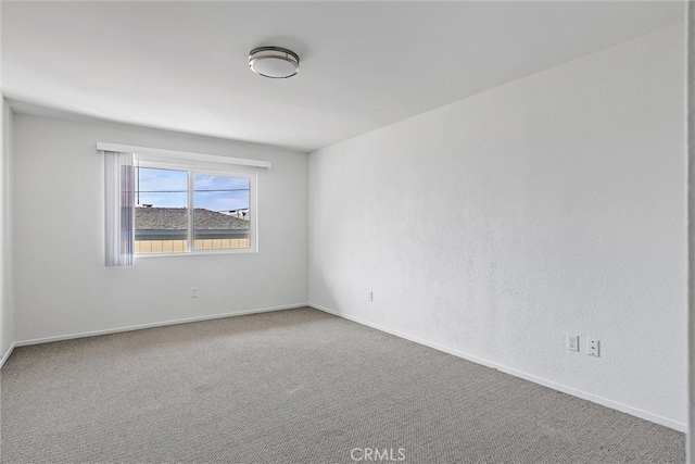 unfurnished room featuring carpet floors