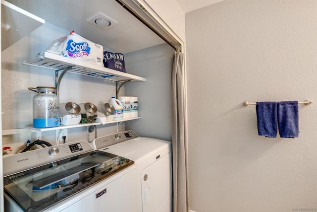 laundry area featuring independent washer and dryer