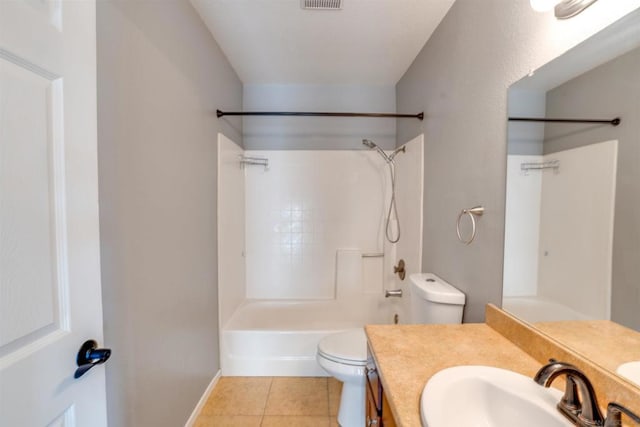 full bathroom with tile patterned flooring, vanity,  shower combination, and toilet