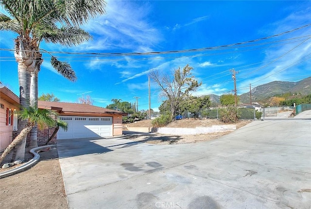 exterior space featuring a mountain view