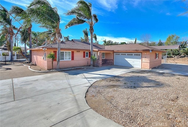 ranch-style home featuring a garage