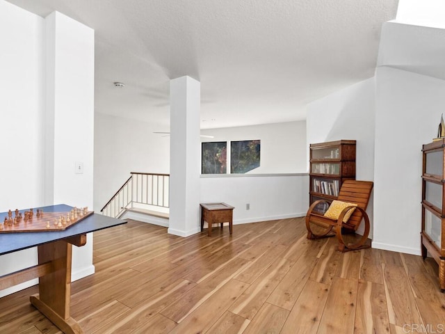 living area with light hardwood / wood-style floors