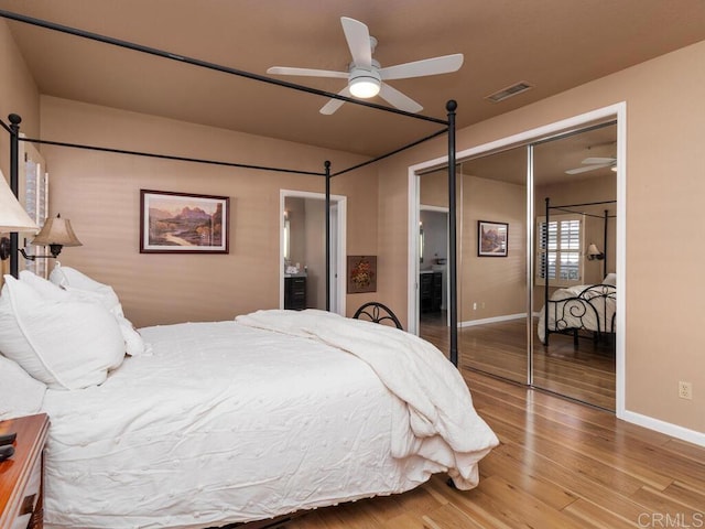 bedroom featuring a closet, ceiling fan, and hardwood / wood-style floors