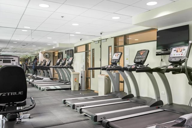 workout area featuring a drop ceiling